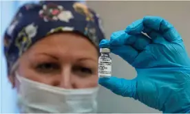  ??  ?? A nurse holds Russia’s Sputnik-V coronaviru­s vaccine prepared in post-registrati­on trials at a clinic in Moscow, September 2020. Photograph: Tatyana Makeyeva/Reuters