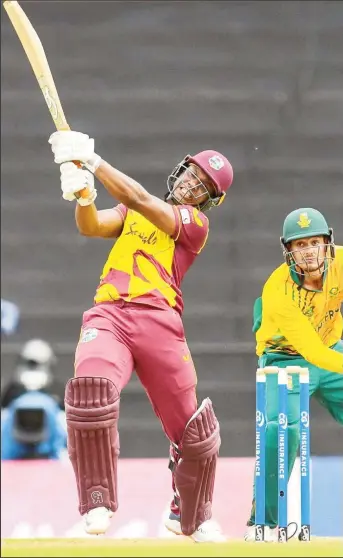  ??  ?? Left-handed opener Evin Lewis goes on the attack during his top score of 71 in yesterday’s opening T20 Internatio­nal.