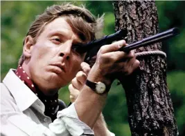  ??  ?? Killer: Edward Fox as the assassin in The Day of the Jackal