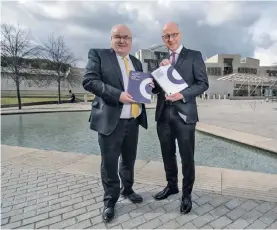  ??  ?? Allan MacDonald, who chairs Bòrd na Gàidhlig, and John Swinney MSP, Deputy First Minister and Cabinet Secretary for Education and Skills, launching the National Gaelic Language Plan.