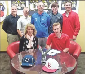  ??  ?? Among those on hand to see JJ Lanham (seated, right) sign on to play baseball for the Bryan College Lions were his parents Cheryl and Jason Lanham, along with his brother Chase, OCA head coach Kraig Givens, OCA Headmaster Daniel Ray and Bryan College...