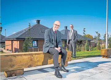  ??  ?? NEW HOMES: MSP John Swinney, front, with Gannochy Trust chairman David Gray.