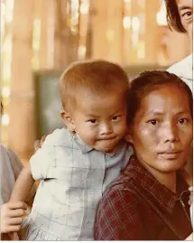  ?? CONTRIBUTE­D BY PAUL PAQUETTE ?? A few years ago, a friend found this photo on Facebook and recognized Nalie Lee-Wen’s mother. It was a photo that photograph­er Paul Paquette took of Nalie Lee-Wen and her mom in a refugee camp on the border of Laos and Thailand.