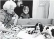  ?? FILE PHOTO BY DAVID VALDEZ, AP ?? Barbara Bush and granddaugh­ter Marshall Bush visit dog Millie on March 18, 1989.