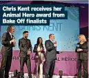  ?? ?? Chris Kent receives her Animal Hero award from Bake Off finalists