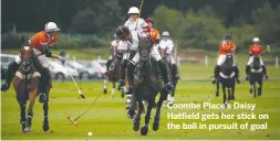  ??  ?? Coombe Place’s Daisy Hatfield gets her stick on the ball in pursuit of goal