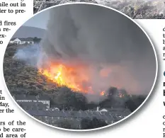  ??  ?? A gorse fire near homes in Newry on Friday