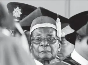  ?? REUTERS/Philimon Bulawayo ?? Zimbabwe President Robert Mugabe attends a university graduation ceremony in Harare, Zimbabwe.