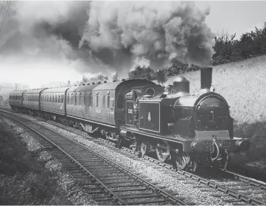  ?? Author ?? A long-term resident of Dalry Road shed was McIntosh ‘439’ class 0-4-4T No 55202, which was always very clean. In May 1955 it is recorded south of Craigleith on approach to Ravelston Dykes at the head of the 1.43pm Leith (North) to Edinburgh (Princes Street) local service made up of suburban stock. New from St Rollox Works as Caledonian Railway No 469 in December 1909, it would finally be transferre­d away from Dalry Road in the fourweeks ending 14 January 1961, Perth being its new home, although only until withdrawal in the August. The last of the family of ‘Passenger Tanks’ at Dalry Road proved to be Nos 55124 and 55165, from the Lambie and McIntosh eras respective­ly, both of which were condemned from the shed in October 1961.