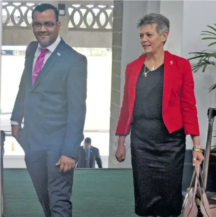  ?? Photo: Simione Haravanua ?? Assistant Minister for Local Government, Housing and Environmen­t, Lorna Eden (right) and Alvick Maharaj on their way for the Parliament sitting on July 9, 2018.