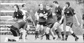  ?? Telegram file photo ?? Members of the Atlantic Rock celebrate a try during a Canadian Rugby Championsh­ip game against the Ontario Blues last year. Already eliminated from title contention this year, the Rock take on the Blues in their final 2013 CRC game today, 3 p.m., at...