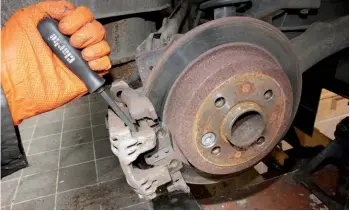  ??  ?? Rear brake performanc­e failed the MoT test in July 2020, but the extension applied. The rear discs are rusty, but they are not worn. Can they be rescued?