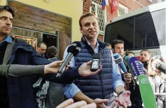  ?? Afp ?? Arcipelago carcerario La conferenza stampa di Navalny appena rimesso in libertà. Tifose dell’Arabia Saudita allo stadio