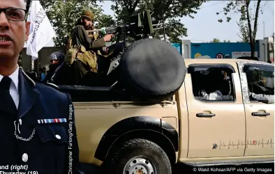  ?? © Wakil Kohsar/AFP via Getty Images ?? SECURITY SCENARIOS: Neil Basu; and (right) armed Taliban fighters in Kabul last Thursday (19)