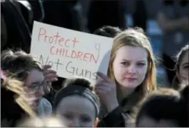  ?? ASSOCIATED PRESS ?? In this Feb. 28 photo, Somerville High School junior Megan Barnes marches with others during a student walkout at the school in Somerville, Mass.