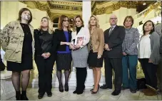  ?? MARC LEVY, FILE - THE AP ?? In this 2018, file photo, victim advocate Jennifer Storm, second left, joins survivors of child sexual abuse including Patty Fortney-Julius, third left, and Mary McHale, second right, waiting for a news conference in the Pennsylvan­ia Capitol, in Harrisburg, Pa. Pennsylvan­ia overhauled its child sexual abuse laws Tuesday, Nov. 26.