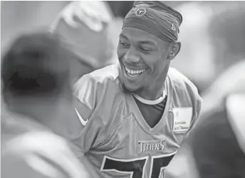  ?? ANDREW NELLES/ TENNESSEAN ?? Titans linebacker Matthew Jackson chats with teammates during an OTA practice at Ascension Saint Thomas Sports Park.