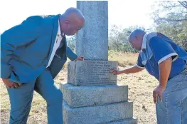  ?? Picture: SIBONGILE NGALWA ?? LEADING TRIBUTES: CEO of the National Heritage Council Sonwabile Mancotywa with great Xhosa intellectu­al, SEK Mqhayi”s grandson, Luvuyo Mqhayi, at his Berlin grave site yesterday.