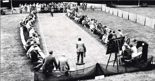  ?? Picture: Images of Canterbury book ?? The final of the Canterbury Bat & Trap Festival Cup tournament was held in Dane John, Canterbury in 1954. British Legion (who won the trophy) bat against the Post Office Telephones