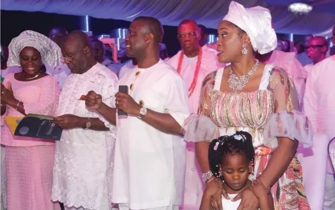  ??  ?? Managing Director of NDDC, Mr. Nsima Ekere (2nd right) with wife, Ese and daughter, former governor of Akwa Ibom State, Obong Victor Attah (2nd left) and his wife, Peace and former Minister of Petroleum Minister, Chief Don Etiebet (behind), at the Thanksgivi­ng Service in honour of Ekere held at the Methodist Church Ikot Abasi Diocese…recently