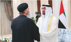  ?? WAM ?? Shaikh Mohammad Bin Zayed receives a guest during an Eid Al Adha reception at Mushrif Palace.