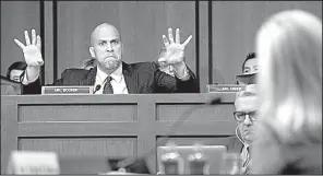  ?? AP/JOSE LUIS MAGANA ?? Democratic Sen. Cory Booker of New Jersey grills Homeland Security Secretary Kirstjen Nielsen during a Senate Judiciary Committee hearing on immigratio­n policy.