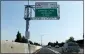  ?? RAY CHAVEZ — STAFF ARCHIVES ?? An express lane sign stands on Interstate 880 southbound near the Davis Street exit in San Leandro.