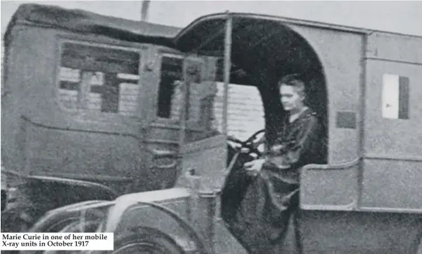  ??  ?? Marie Curie in one of her mobile X-ray units in October 1917