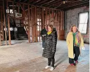  ?? Brian Zahn / Hearst Connecticu­t Media ?? ArtsWest CT President Elinor Slomba, right, tours the inside of 304 Center St. with council members Mitchell Gallignano, D-4, and Colleen O'Connor, R-At Large, on Jan. 31. The council voted to list the building, a proposed downtown arts center, for sale on Wednesday.