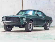 ?? COURTESY OF MECUM AUCTIONS ?? A replica of a 1968 Ford Mustang fastback that was used in the 1968 Steve McQueen movie "Bullitt"