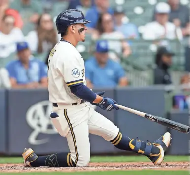  ?? GETTY IMAGES ?? The Brewers’ Luis Urias strikes out in the eighth inning Tuesday at American Family Field.