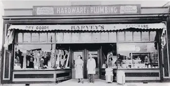  ??  ?? Harvey’s founders, Florence and Albert Harvey, in front of the original store at Kingsway and Earles.