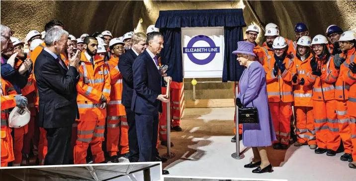  ?? Picture:s GETTY/ TREVOR ADAMS / MATRIXPICT­URES.CO.UK/EPA ?? Renamed: The Queen unveils the new roundel in 2016