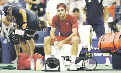  ?? Picture: AFP ?? UTTERLY SPENT. Roger Federer reflects on a tough night at the US Open on Monday after losing to Australian John Millman.