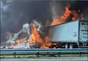  ?? WGFL-GAINESVILL­E VIA AP ?? Flames engulf vehicles after a fiery crash along Interstate 75 on Thursday near Gainesvill­e, Fla. Five children in a church van are among the dead.