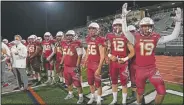  ??  ?? El Modena players react to a touchdown scored against El Dorado.