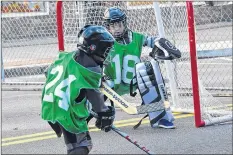  ??  ?? There was plenty of cuteness in the younger divisions of the street hockey event, which started out with a novice division. The other divisions were atom, peewee, bantam, midget and open.