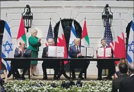  ?? Alex Brandon Associated Press ?? PRESIDENT Trump with, from left, Bahrain’s Abdullatif bin Rashid Zayani, Israel’s Benjamin Netanyahu, and the Emirates’ Abdullah bin Zayed al-Nahyan.