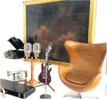  ??  ?? A 1950’s leather egg chair, a vintage candy dispenser and a John Lucas red painting acquired from Mandarin Hotel.