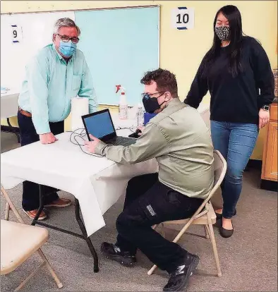  ?? Photo courtesy of Steve Dunn ?? First Selectman Steve Dunn, visits Brookfield­s larger COVID-19 vaccinatio­n clinic at St. Joseph Catholica Academy before it opened Tuesday. The clinic moved from the town’s senior center to administer more vaccinatio­ns.