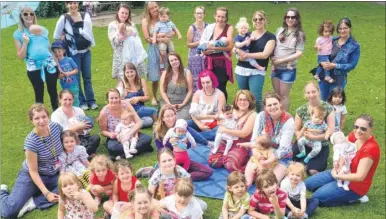  ?? Picture: Chris Davey FM4874412 ?? Mums and children at the Big Latch On breastfeed­ing awareness event