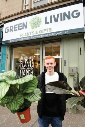  ??  ?? Firmly planted
Jordan Trainer outside his new shop in Partick