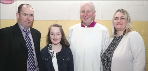  ??  ?? Keira McWilliams with Dean Colum Curry and her Godparents Martin and Avril.