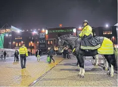  ?? Picture Richard Lee ?? Police patrol Celtic Park before kick off on night of the riot on November 26, 2015