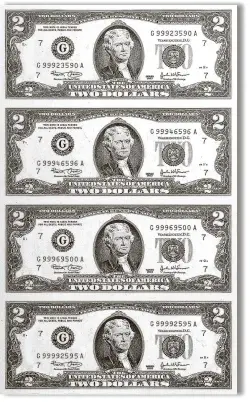  ??  ?? ■ FULL UNCUT SHEETS: Above is one of the valuable uncut sheets of four never circulated $2 bills that are actually being released to Atlanta area residents. These crisp seldom seen uncut sheets of real money are being released on a first come, first...