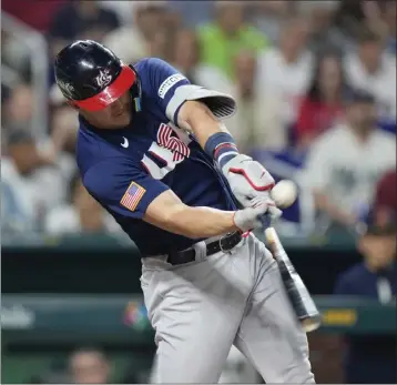  ?? WILFREDO LEE — THE ASSOCIATED PRESS ?? Mike Trout hit this double in the first inning of Tuesday’s WBC final but struck out against Shohei Ohtani in the ninth.