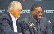  ?? JIM RASSOL/STAFF FILE PHOTO ?? “They see a big dude that’s 6-10 and they think he’s listening to all the hip-hop and stuff like that. I just listen to my Katy Perry,” says Adebayo, here with Heat President Pat Riley.