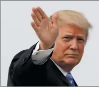  ?? The Associated Press ?? TRUMP: President Donald Trump waves as he boards Air Force One before his departure Thursday from Andrews Air Force Base, Md., to his Mar-a-Largo resort in Florida.