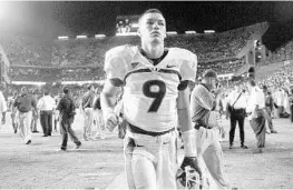  ?? JIM RASSOL/STAFF FILE PHOTO ?? Miami quarterbac­k Robert Marve leaves the field after a 2008 loss at Florida. Marve, now the athletic director at Tampa Sports Academy and co-owner of the Kaleo/Marve Quarterbac­k Academy, is accused by an ex-girlfriend of sexual assault and battery.