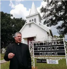  ?? Associated Press ?? The Rev. Greg Plata speaks Friday outside the St. Thomas Catholic Church that he pastors in Lexington, Miss., about the community loss with the murders of sisters Margaret Held and Paula Merrill, both nurse practition­ers in the town.